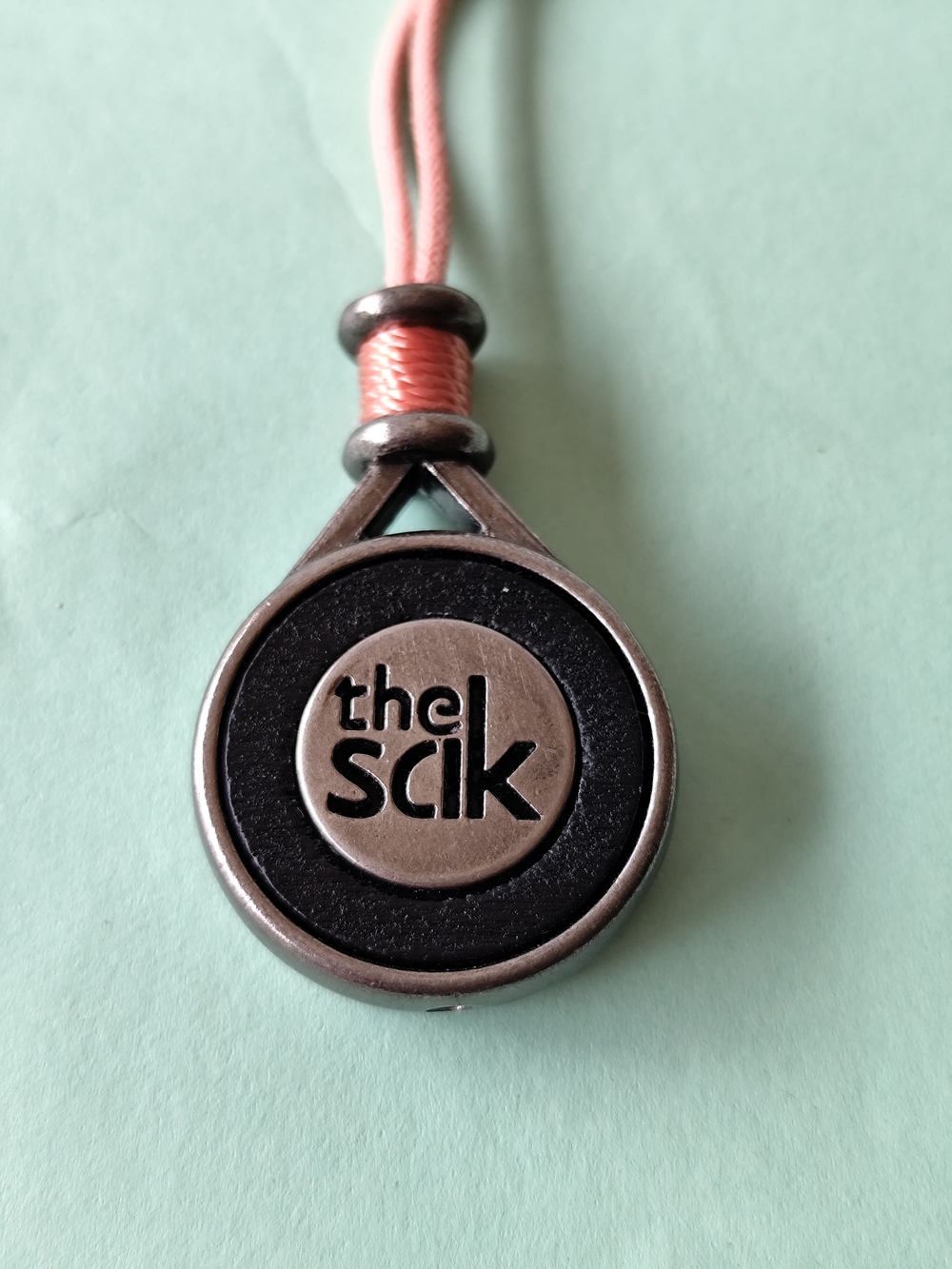 3/$20💗The SaK Logo Tag Bag Charm in Black and Coral Pink
